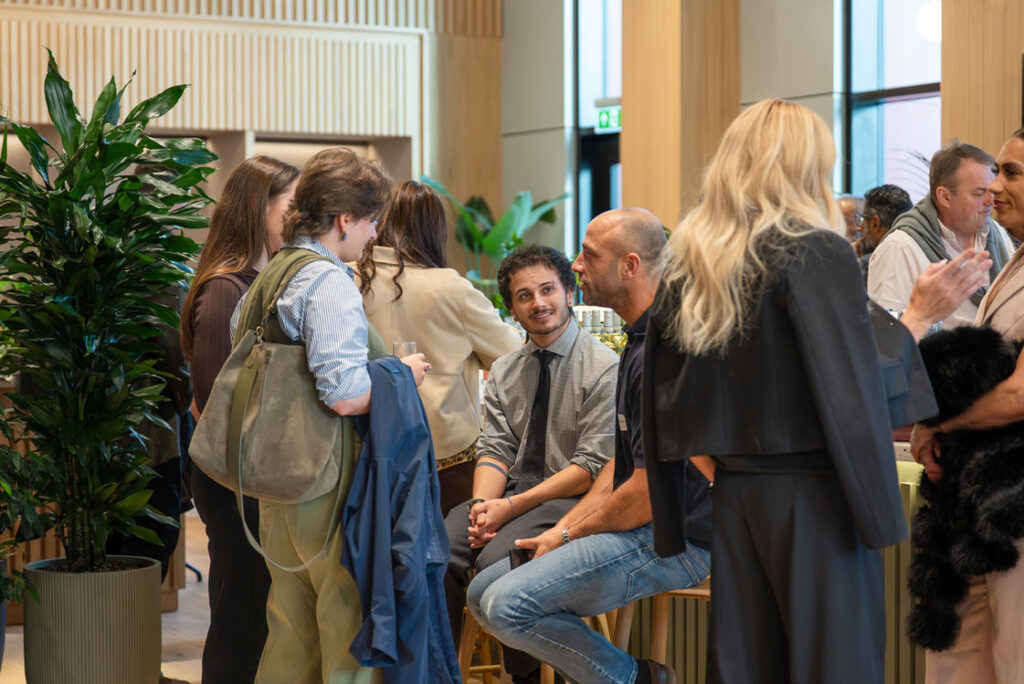 Networking in the light-filled communal space at Millennium Point