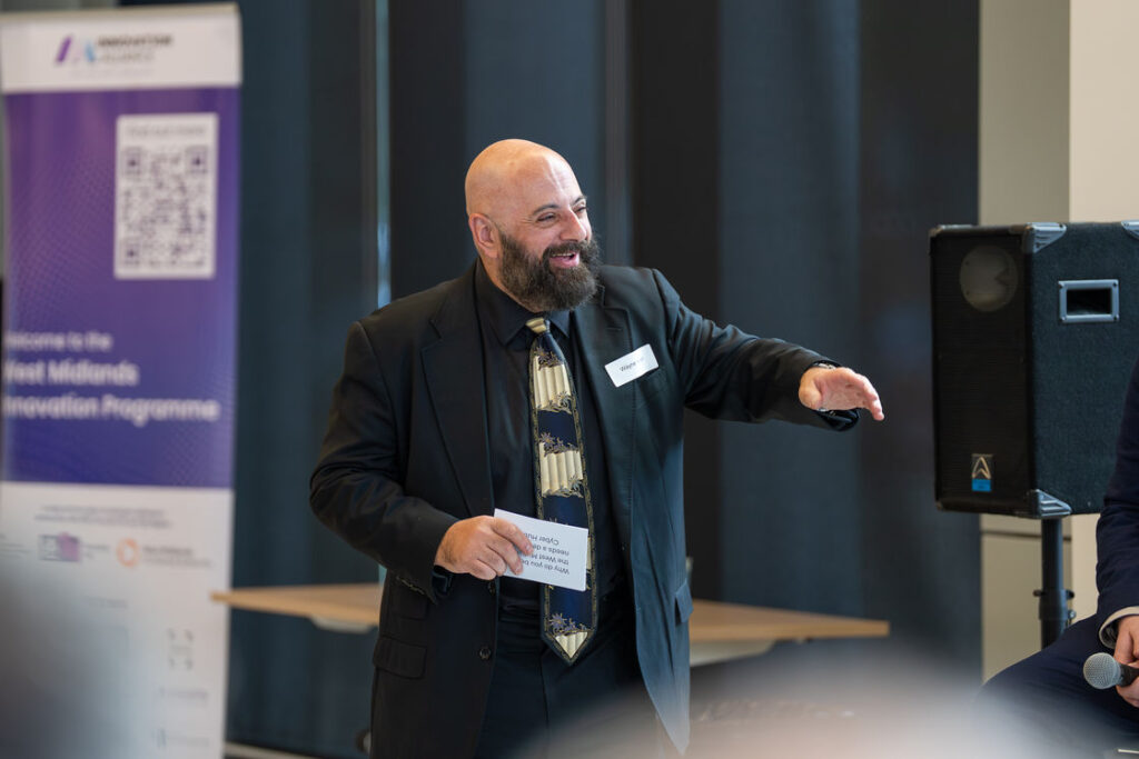 A speaker addressing attendees at a Hub session